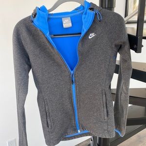 Nike gray zip up jacket with blue fleece interior